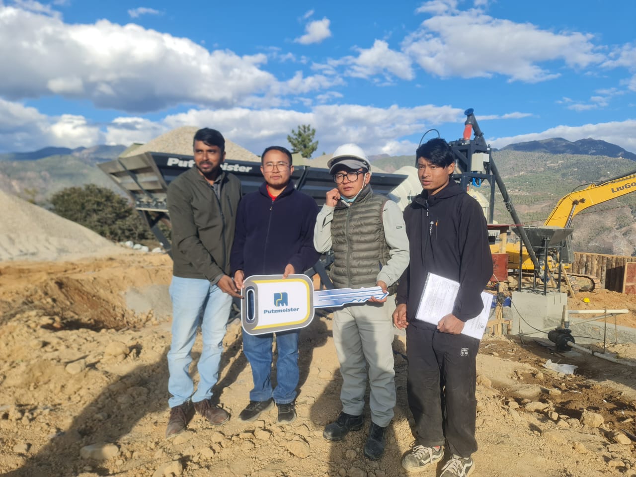 Batching plant and boom pump handover to Shambhala Infra